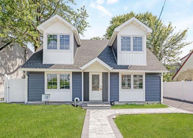 Property at 335 Peninsula Blvd, Cedarhurst, NY 11516, 4 beds, 2 baths