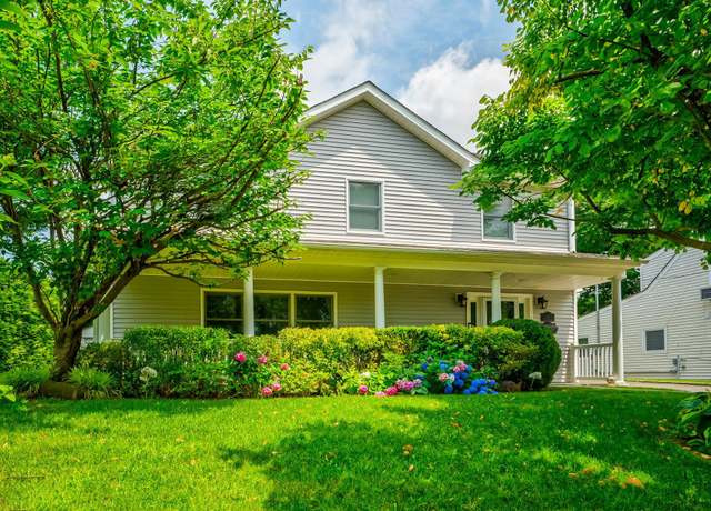 Property at 9 Poplar Pl, Port Washington, NY 11050, 4 beds, 3 baths