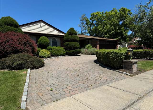 Property at 61 John St, Port Jefferson Station, NY 11776, 4 beds, 2 baths