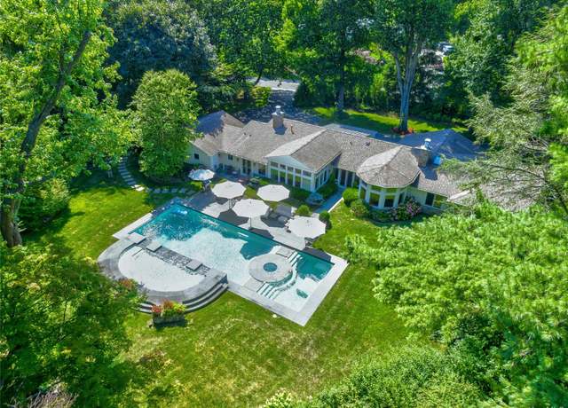 Property at 10 Woodland Dr, Sands Point, NY 11050, 4 beds, 4.5 baths