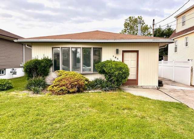 Property at 163 Vanderbilt Ave, Island Park, NY 11558, 3 beds, 2 baths