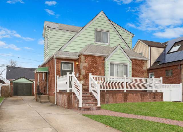 Property at 127 Locustwood Blvd, Elmont, NY 11003, 4 beds, 2 baths