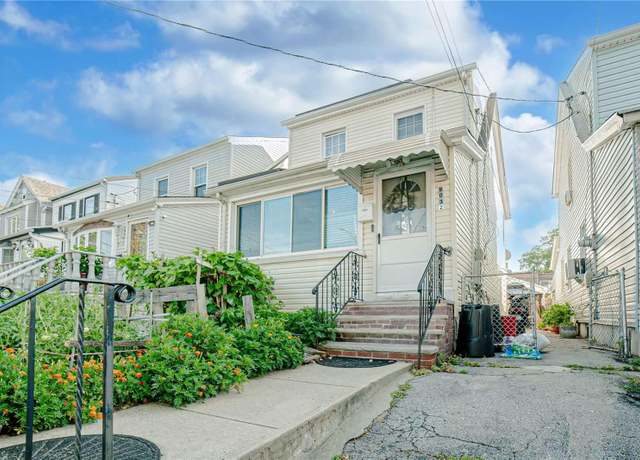 Property at 90-32 207th St, Queens Village, NY 11428, 3 beds, 1.5 baths