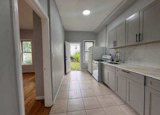 Property at 10326 171st St, Jamaica, NY 11433, 6 beds, 2 baths