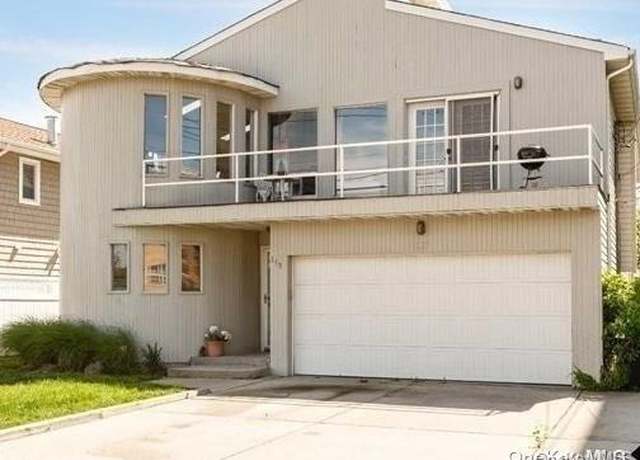 Property at 118 Magnolia Blvd, Long Beach, NY 11561, 5 beds, 3 baths