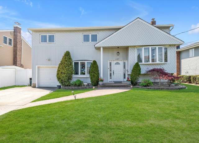 Property at 427 Wanamaker St, Oceanside, NY 11572, 4 beds, 2.5 baths