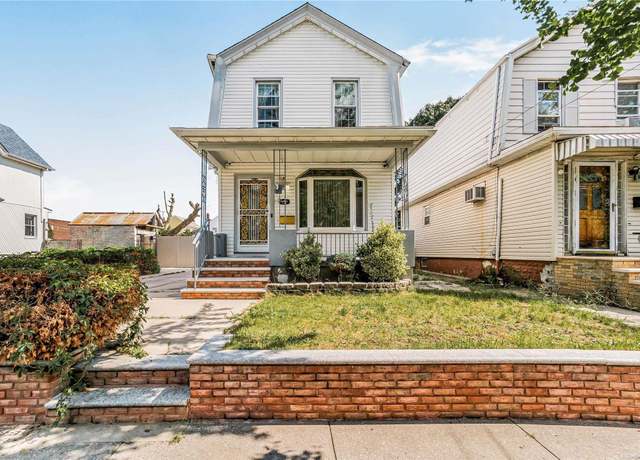 Property at 105-35 86th St, Ozone Park, NY 11417, 3 beds, 2 baths