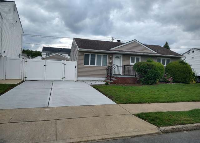 Property at 708 Anderson Ave, Franklin Square, NY 11010, 4 beds, 2 baths