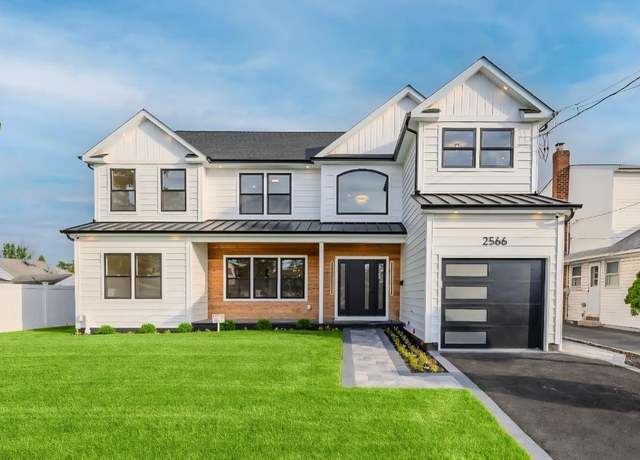 Property at 2566 Aster Pl N, Westbury, NY 11590, 6 beds, 4 baths