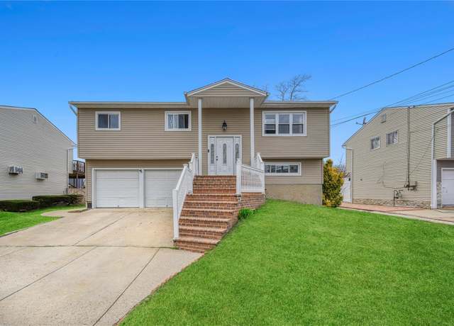 Property at 3 Ozone Pl, Massapequa, NY 11758, 4 beds, 2 baths
