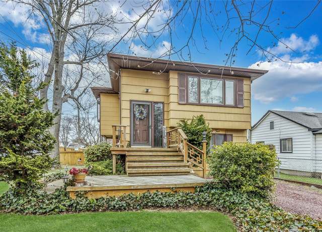 Property at 132 Lake Dr, Copiague, NY 11726, 4 beds, 2 baths