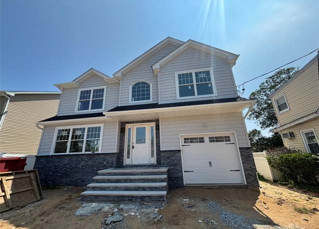 Property at 335 Evans Ave, Elmont, NY 11003, 4 beds, 2.5 baths
