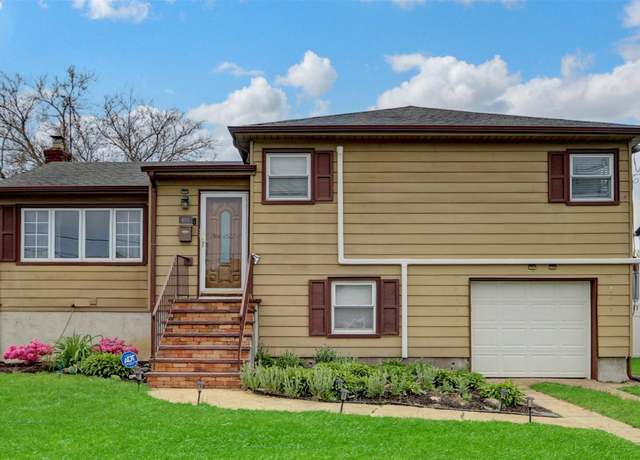 Property at 405 Miller Ave, Freeport, NY 11520, 4 beds, 2 baths