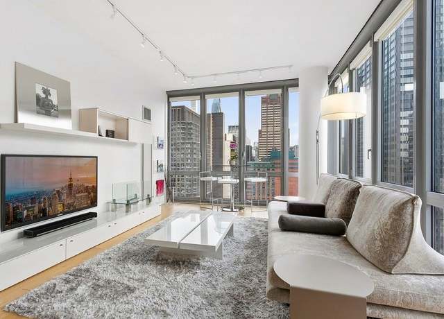 Property at 310 W 52 St Unit 35A, New York (manhattan), NY 10019, 1 bed, 1.5 baths