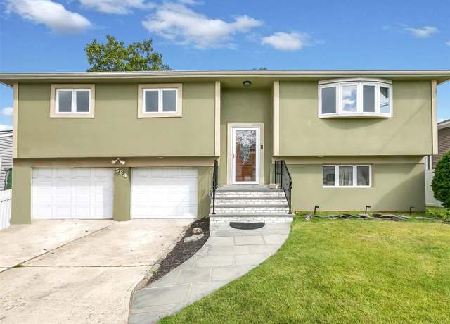 Property at 584 Yale St, Oceanside, NY 11572, 4 beds, 2 baths