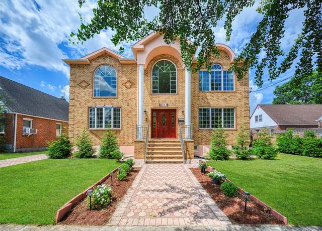 Property at 83-14 266th St, Glen Oaks, NY 11004, 5 beds, 3.5 baths