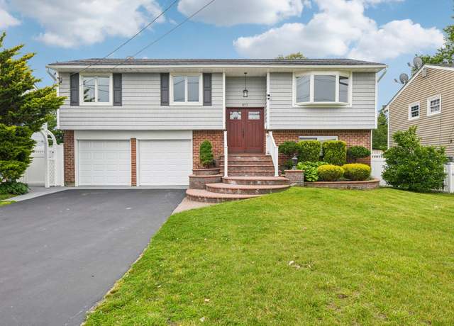 Property at 872 Main St, Farmingdale, NY 11735, 4 beds, 2 baths