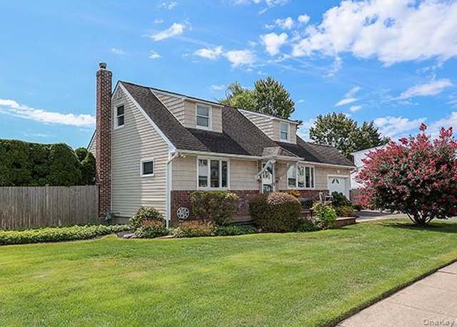 Property at 22 Colonial Dr, Farmingdale, NY 11735, 4 beds, 2 baths