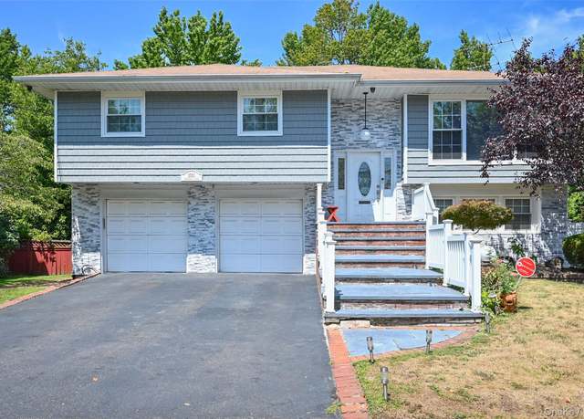 Property at 1061 Fordham Ln, Woodmere, NY 11598, 5 beds, 3 baths