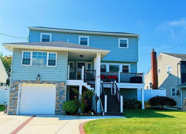 Property at 22 Wilshire Ct, Freeport, NY 11520, 4 beds, 2 baths