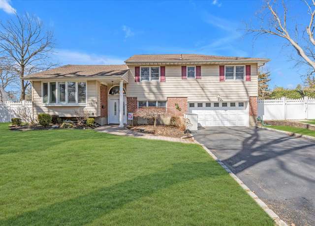 Property at 9 Osage Dr, Huntington Station, NY 11746, 4 beds, 3 baths