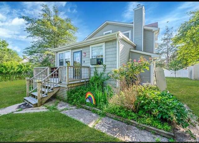 Property at 52 Manhasset Dr, Mastic Beach, NY 11951, 4 beds, 1.5 baths