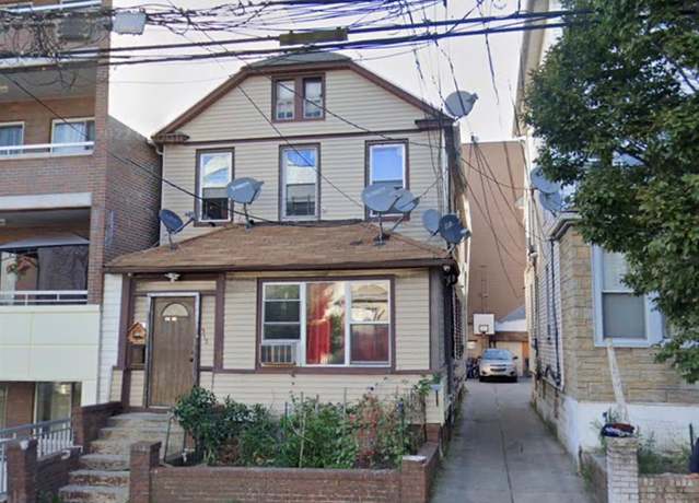 Property at 37-23 111th St, Corona, NY 11368, 6 beds, 2 baths