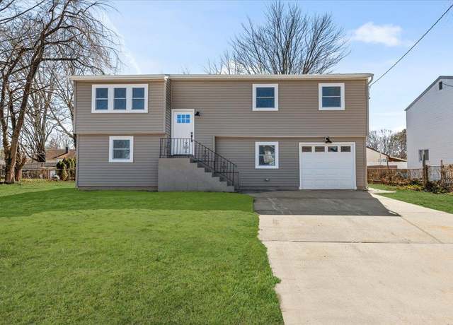 Property at 56 Orange St, Central Islip, NY 11722, 4 beds, 2 baths