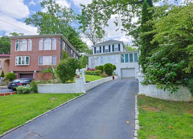 Property at 19512 Mclaughlin Ave, Holliswood, NY 11423, 4 beds, 2 baths