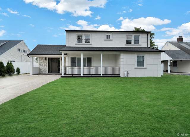 Property at 18 Mist Ln, Westbury, NY 11590, 4 beds, 2 baths