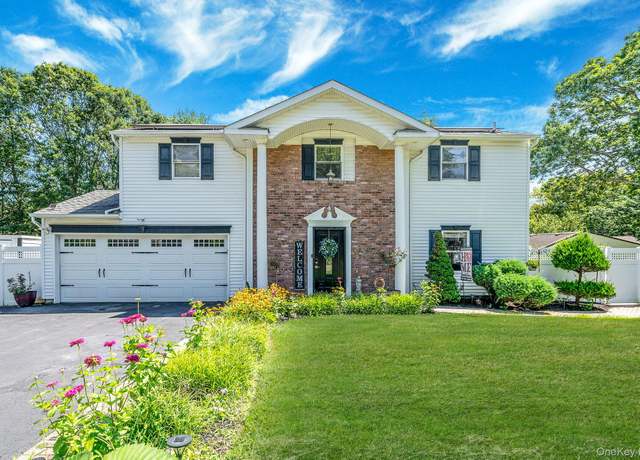 Property at 23 Woodbine St, Coram, NY 11727, 4 beds, 2.5 baths