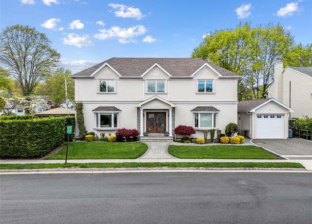 Property at 37 Maple St, Roslyn Heights, NY 11577, 4 beds, 2.5 baths