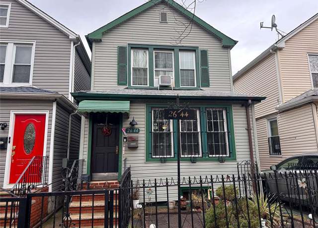 Property at 26-44 92nd St, Flushing, NY 11369, 4 beds, 3 baths