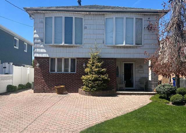 Property at 163-20 88th St, Howard Beach, NY 11414, 4 beds, 3 baths