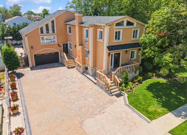 Property at 35 Franklin St, East Rockaway, NY 11518, 5 beds, 4 baths