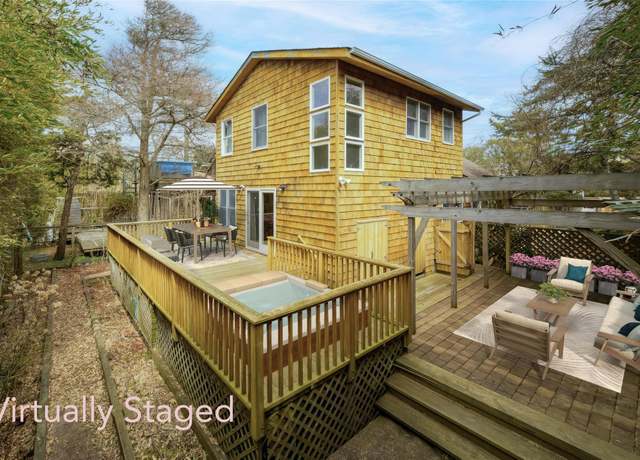 Property at 686 Ocean Breeze Walk, Ocean Beach, NY 11770, 4 beds, 2 baths
