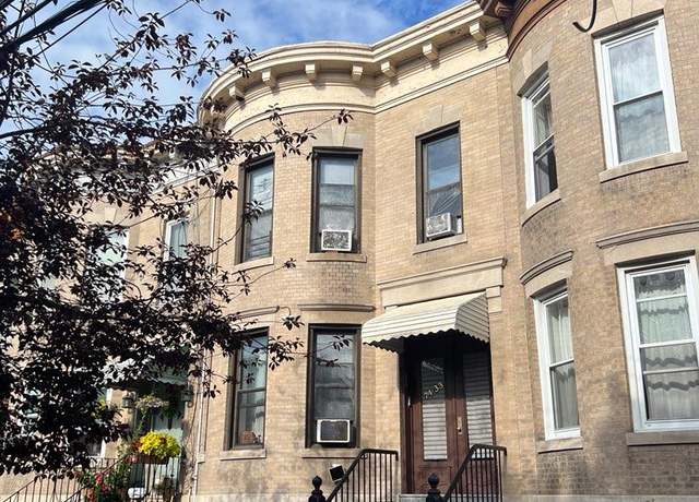 Property at 74-33 65th St, Glendale, NY 11385, 7 beds, 2 baths