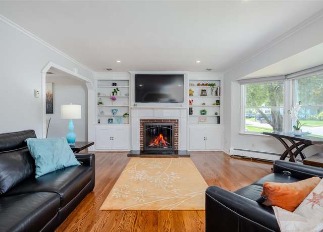 Property at 11 Spruce St, Garden City, NY 11530, 3 beds, 1.5 baths