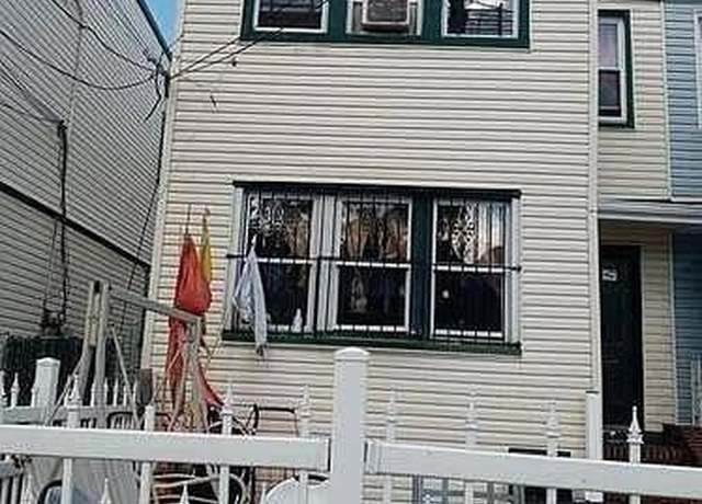 Property at 104-17 106th St, Ozone Park, NY 11417
