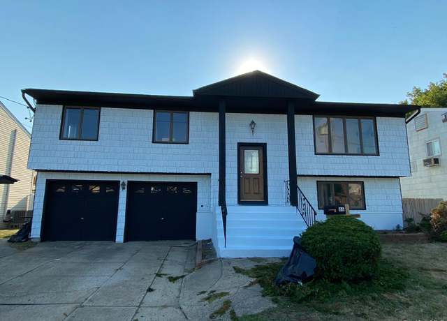 Property at 86 Empire Blvd, Island Park, NY 11558, 4 beds, 3 baths