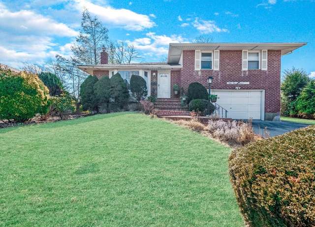 Property at 100 Robbins Ln, Jericho, NY 11753, 4 beds, 2.5 baths