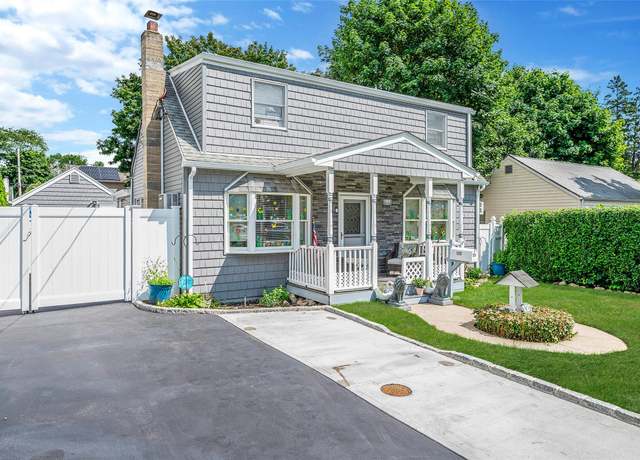 Property at 126 E 12th St, Huntington Station, NY 11746, 4 beds, 3 baths