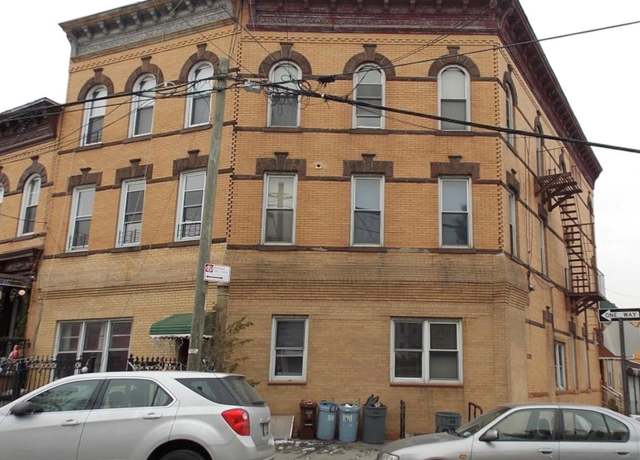 Property at 7402 65th St, Glendale, NY 11385, 9 beds, 4 baths