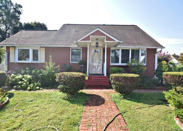 Property at 14 E Walnut St, Central Islip, NY 11722, 4 beds, 2 baths