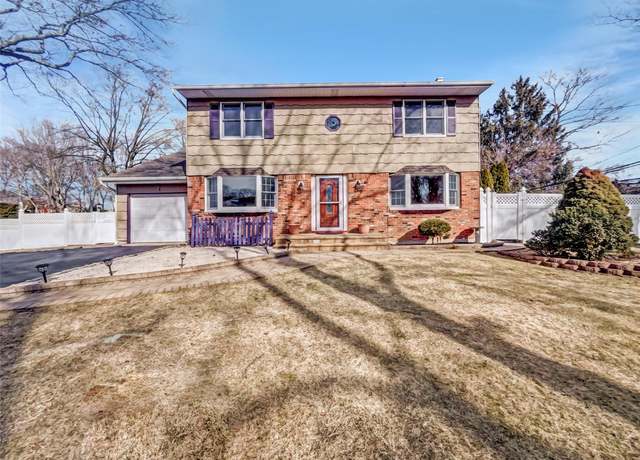 Property at 1 Charter Ln, Smithtown, NY 11787, 3 beds, 2.5 baths