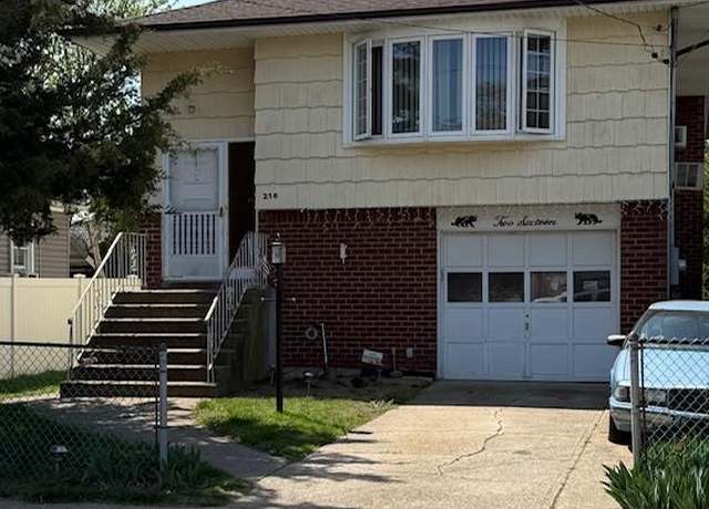 Property at 216 Hill Ave, Elmont, NY 11003, 4 beds, 2 baths