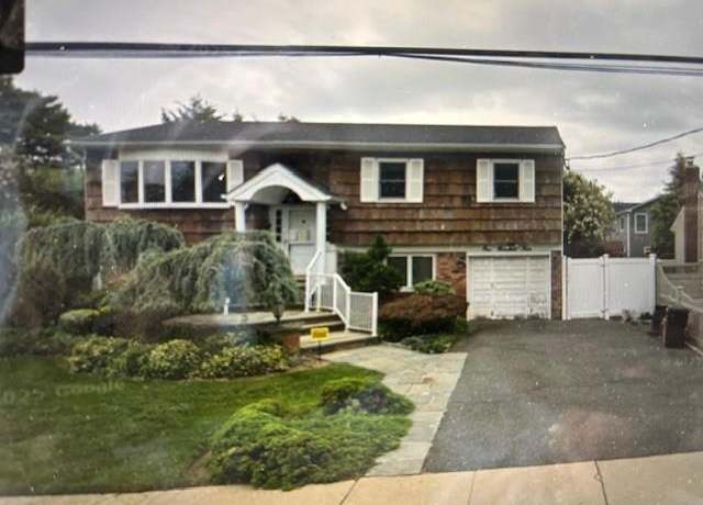 Property at 104 Clark Ave, Massapequa, NY 11758, 4 beds, 2 baths