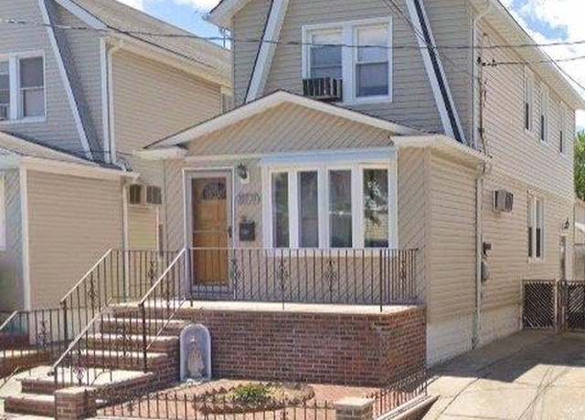 Property at 107-24 87th St, Ozone Park, NY 11417, 3 beds, 2 baths