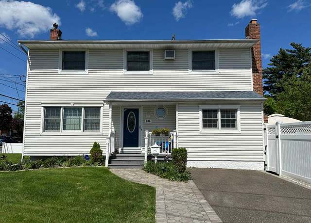 Property at 899 East Meadow Ave, North Bellmore, NY 11710, 4 beds, 2.5 baths