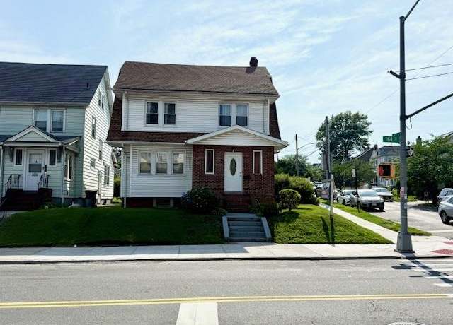 Property at 8456 164th St, Jamaica Estates, NY 11432, 5 beds, 3 baths